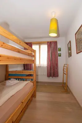 Ein Bett oder Betten in einem Zimmer der Unterkunft Ferienwohnung Gartenweg