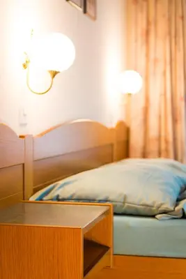 Ein Bett oder Betten in einem Zimmer der Unterkunft Haus Evita