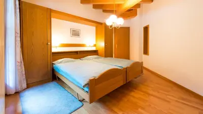 Ein Bett oder Betten in einem Zimmer der Unterkunft Haus Evita