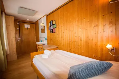 Ein Bett oder Betten in einem Zimmer der Unterkunft Hotel Hornerpub