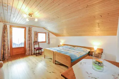 Ein Bett oder Betten in einem Zimmer der Unterkunft Haus Weissmies
