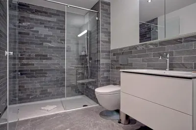 Ein Badezimmer in der Unterkunft Apartment JungfrauCenter Schynige Platte - GRIWA RENT AG