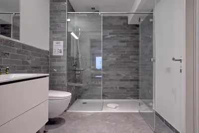 Ein Badezimmer in der Unterkunft Apartment JungfrauCenter Schynige Platte - GRIWA RENT AG