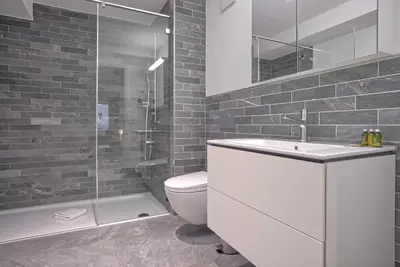Ein Badezimmer in der Unterkunft Apartment JungfrauCenter Bällenhöchst - GRIWA RENT AG