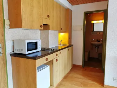 Küche/Küchenzeile in der Unterkunft Downtown Apartment 9