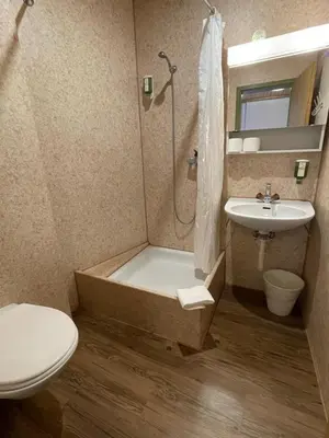 Ein Badezimmer in der Unterkunft Downtown Apartment 9