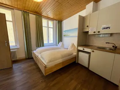 Küche/Küchenzeile in der Unterkunft Downtown Apartment 9