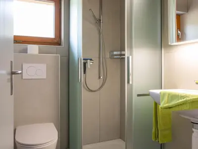 Ein Badezimmer in der Unterkunft Apartment Zurschmitten 17 1- OG Süd by Interhome