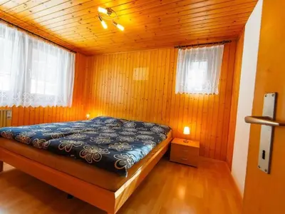 Ein Bett oder Betten in einem Zimmer der Unterkunft Apartment Almenrausch 1- OG Süd-Ost by Interhome