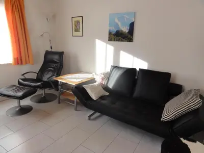 Ein Sitzbereich in der Unterkunft Apartment Beck