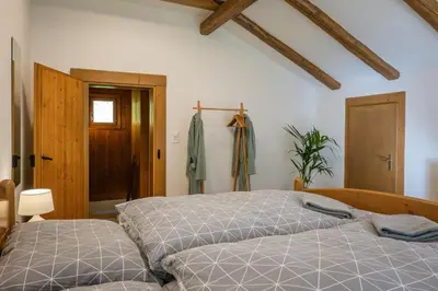 Ein Bett oder Betten in einem Zimmer der Unterkunft Chalet Elza