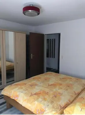 Ein Bett oder Betten in einem Zimmer der Unterkunft Apartment Zayetta