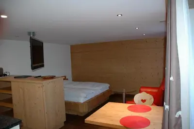 Ein Bett oder Betten in einem Zimmer der Unterkunft Ferienwohnung Uf dr Liwwi