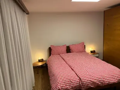 Ein Bett oder Betten in einem Zimmer der Unterkunft Residence A