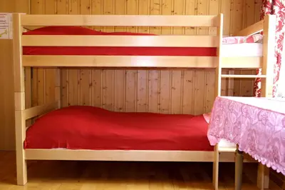 Ein Bett oder Betten in einem Zimmer der Unterkunft Hotel-Restaurant Stechelberg Bed & Breakfast