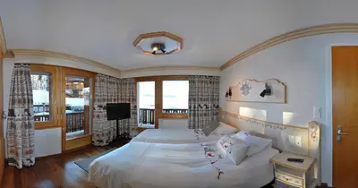 Ein Bett oder Betten in einem Zimmer der Unterkunft Les Petits Mélèzes