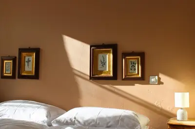Ein Bett oder Betten in einem Zimmer der Unterkunft Hôtel Le Besso - Swiss Romantic Lodge Zinal