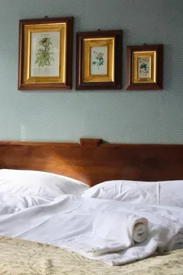 Ein Bett oder Betten in einem Zimmer der Unterkunft Hôtel Le Besso - Swiss Romantic Lodge Zinal