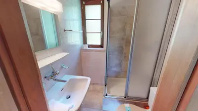 Ein Badezimmer in der Unterkunft Tschuggen 24