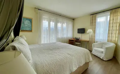 Ein Bett oder Betten in einem Zimmer der Unterkunft Hotel Movieworld