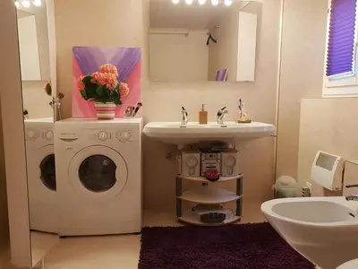 Ein Badezimmer in der Unterkunft Appartamento via Luina