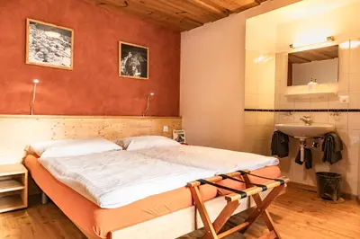 Ein Bett oder Betten in einem Zimmer der Unterkunft Hotel Bahnhof