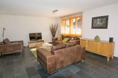 Ein Sitzbereich in der Unterkunft Ferienwohnung Schützenrain