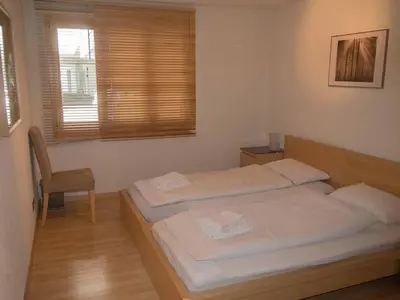 Ein Bett oder Betten in einem Zimmer der Unterkunft Ferienwohnung Schützenrain