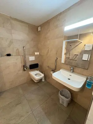 Ein Badezimmer in der Unterkunft Chemihüttli Apartments Axalp