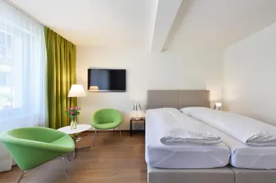Ein Bett oder Betten in einem Zimmer der Unterkunft Hotel Sternen