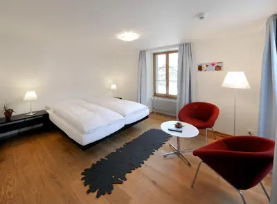 Ein Bett oder Betten in einem Zimmer der Unterkunft Hotel Sternen