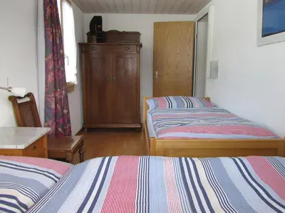 Ein Bett oder Betten in einem Zimmer der Unterkunft Gutenbrunnenstrasse 94
