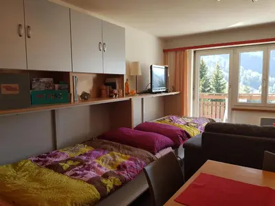 Ein Bett oder Betten in einem Zimmer der Unterkunft 2,5 pces Accueillant comme à la maison