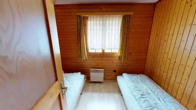 Ein Bett oder Betten in einem Zimmer der Unterkunft Triantha TR0
