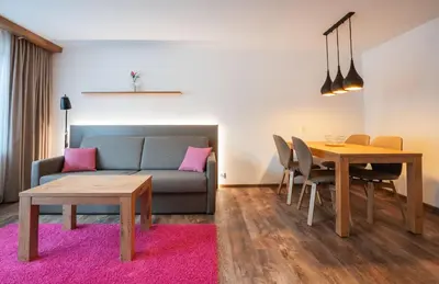 Ein Sitzbereich in der Unterkunft Apartments Patricia