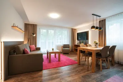Ein Sitzbereich in der Unterkunft Apartments Patricia