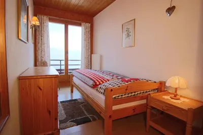 Ein Bett oder Betten in einem Zimmer der Unterkunft Pension Les Audannes