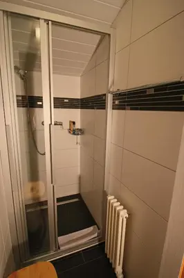 Ein Badezimmer in der Unterkunft Pension Les Audannes