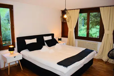 Ein Bett oder Betten in einem Zimmer der Unterkunft Breathtaking Waterfall Apartment