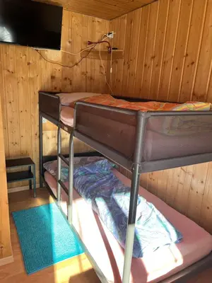 Ein Bett oder Betten in einem Zimmer der Unterkunft Berghotel Furggstalden