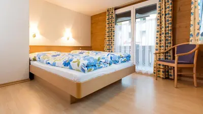Ein Bett oder Betten in einem Zimmer der Unterkunft Chalet Alpenrösli