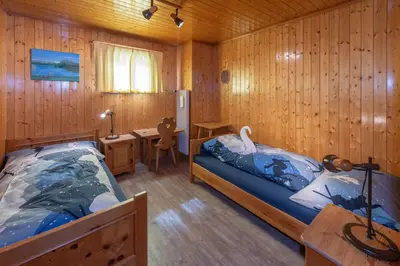 Ein Bett oder Betten in einem Zimmer der Unterkunft Dominique