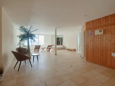 Ein Sitzbereich in der Unterkunft Evelyne