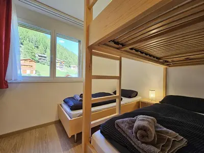 Ein Bett oder Betten in einem Zimmer der Unterkunft Evelyne