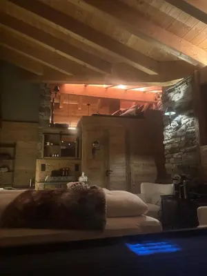 Ein Bett oder Betten in einem Zimmer der Unterkunft Boutique Lodge Spycher