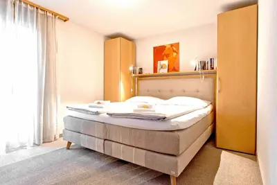 Ein Bett oder Betten in einem Zimmer der Unterkunft Apartment Saphir 2 - GRIWA RENT AG