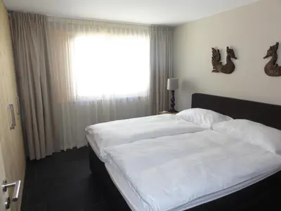 Ein Bett oder Betten in einem Zimmer der Unterkunft Apartment Caspar