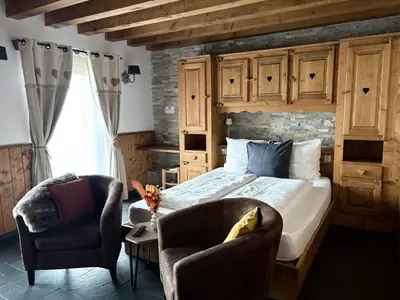 Ein Bett oder Betten in einem Zimmer der Unterkunft De Blockhut