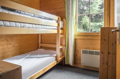 Ein Bett oder Betten in einem Zimmer der Unterkunft Jadwiga EG
