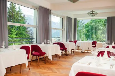 Ein Sitzbereich in der Unterkunft Bellevue Parkhotel & Spa - Relais & Châteaux